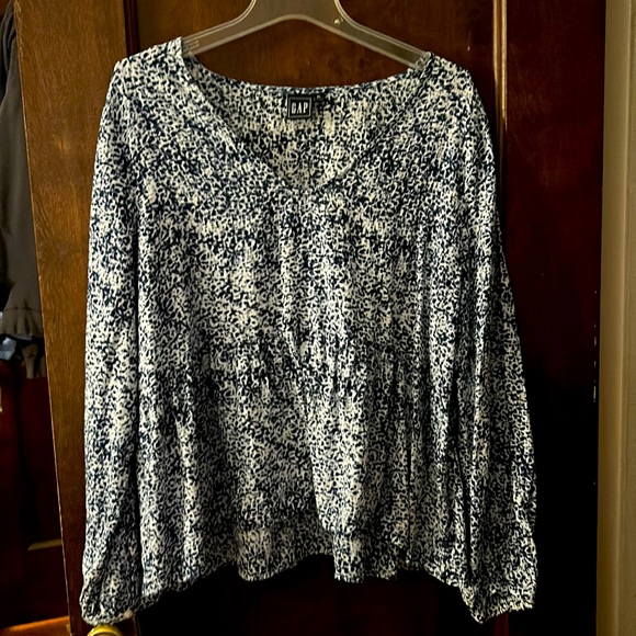 Gap blue and white blouse. Loose fit. Flows nice. Hits around hip - Picture 1 of 3